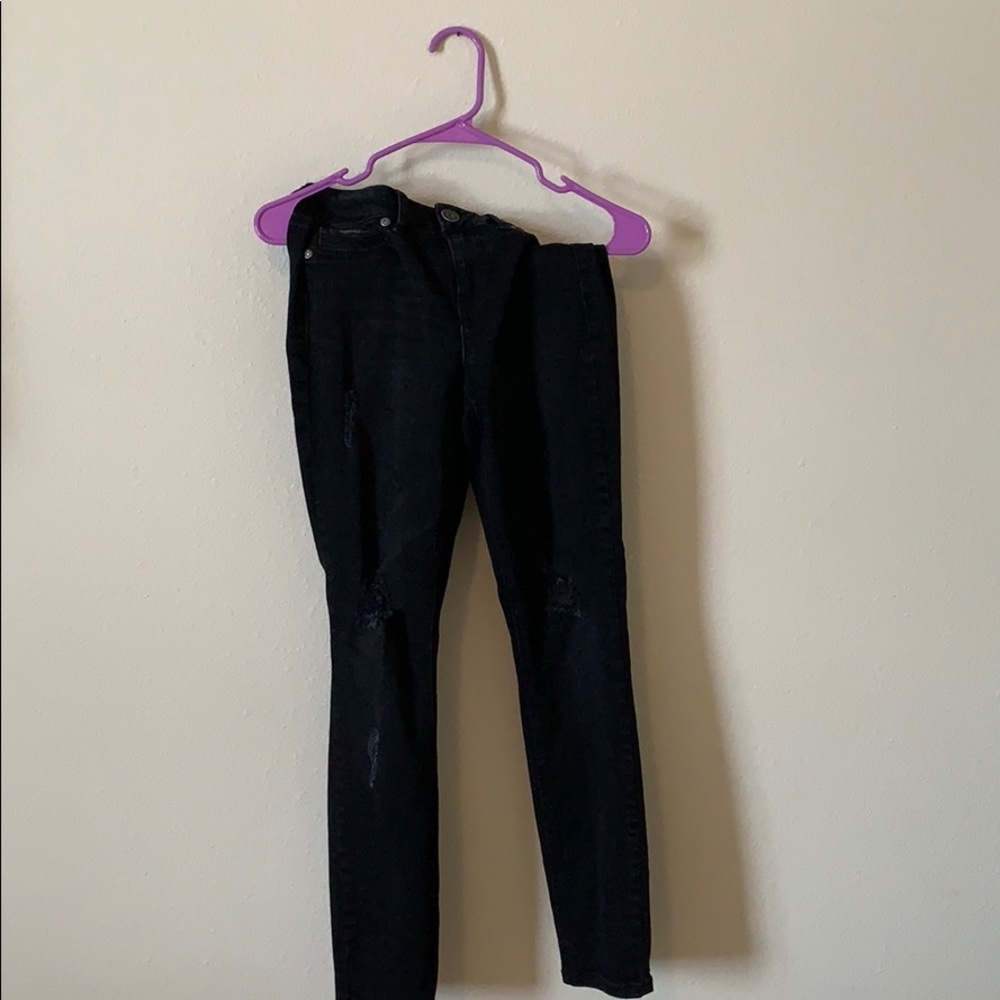 semi ripped black jeans